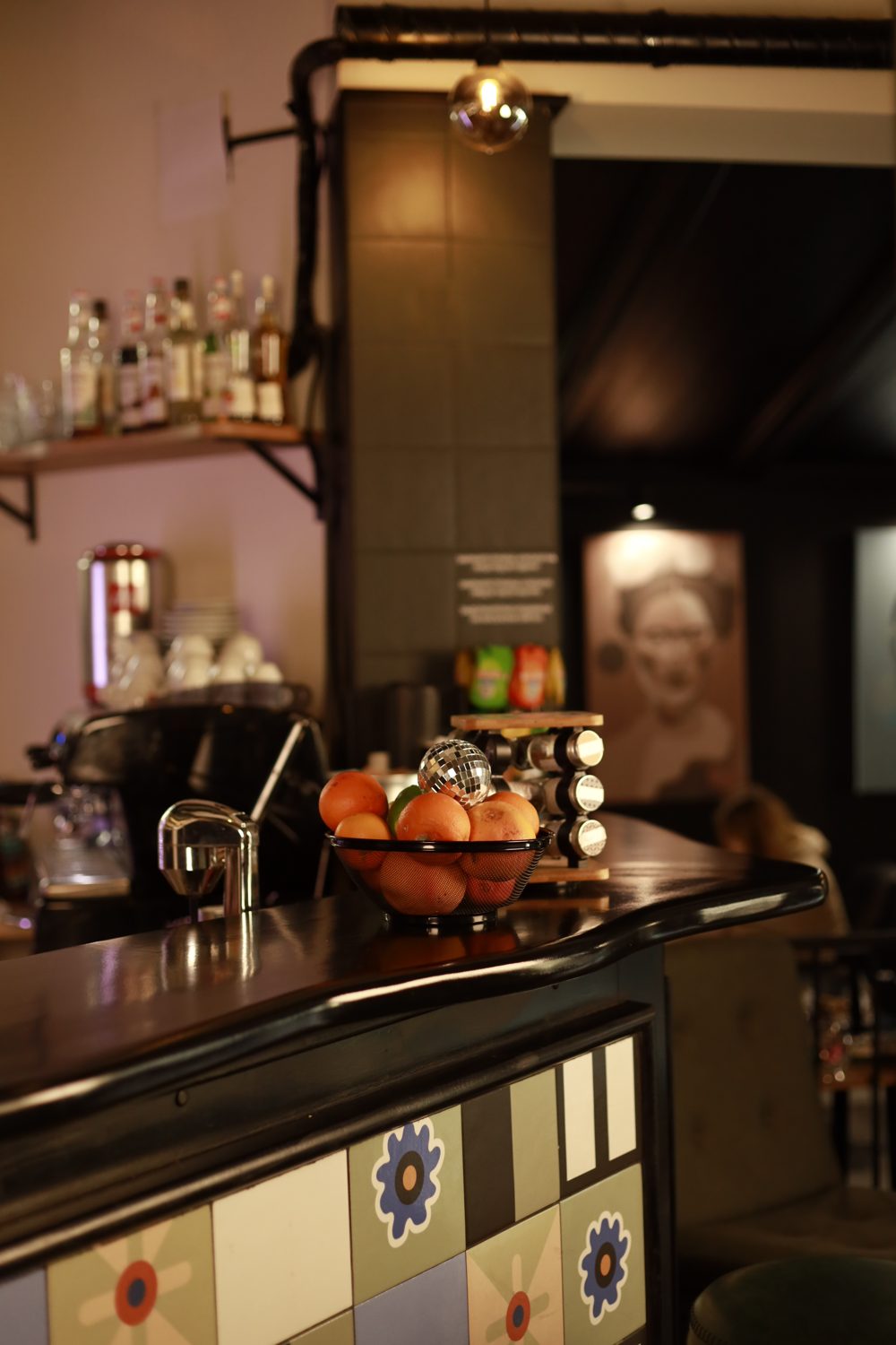 The RABOTEKA bar with a bowl of oranges and a disco ball