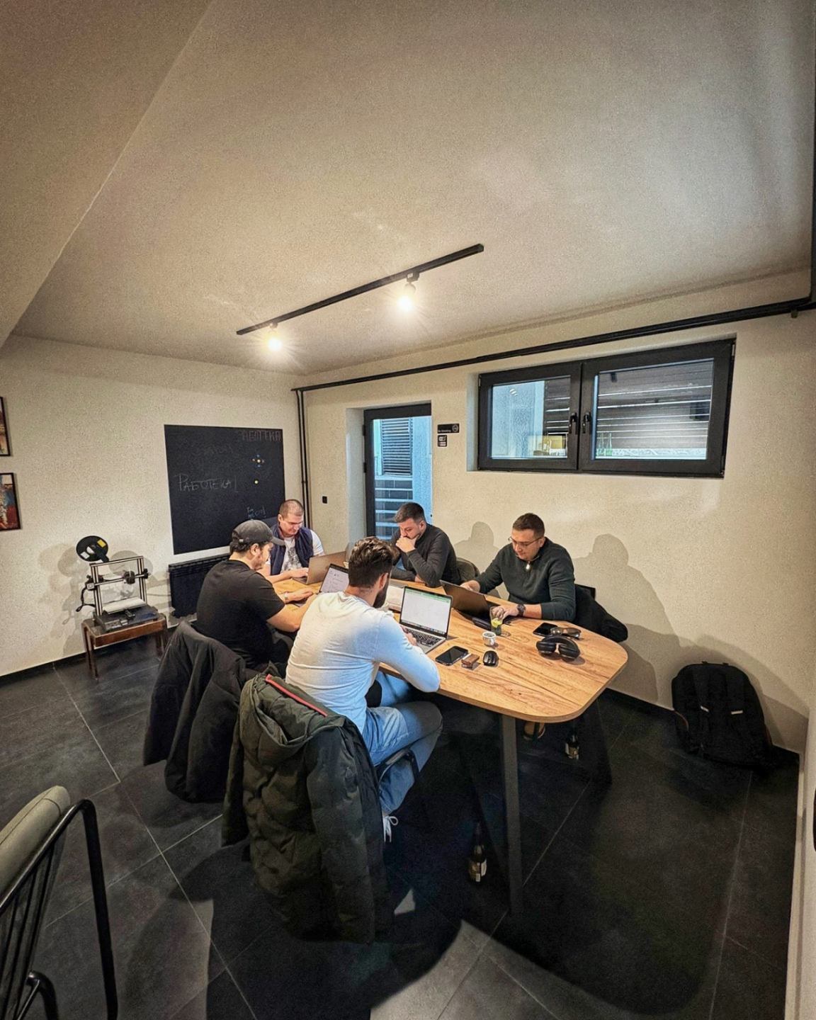 A team of five working together at RABOTEKA